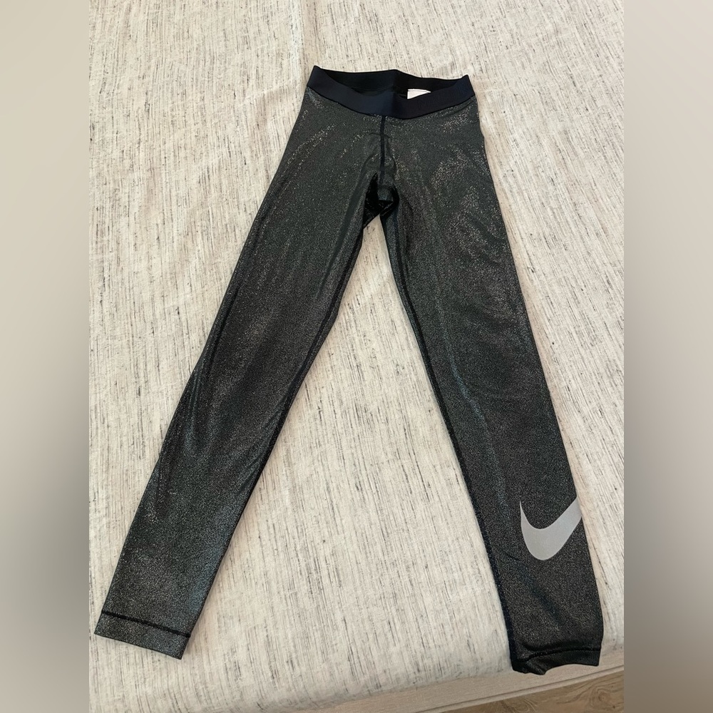 Brand new! Nike sparkly leggings, size small.